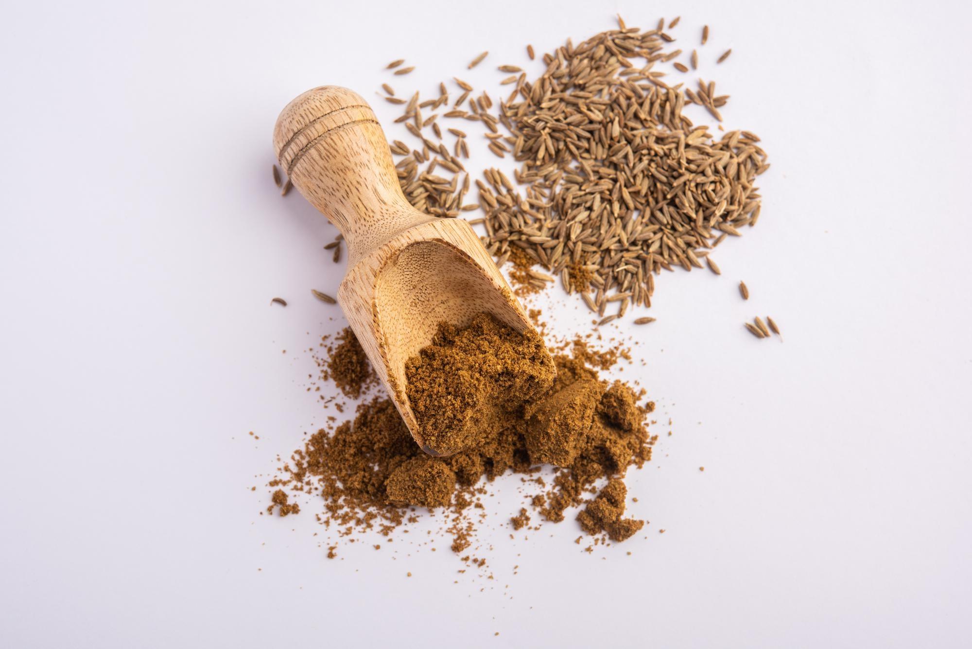 Spoon of jeera seeds showing jeera health benefits